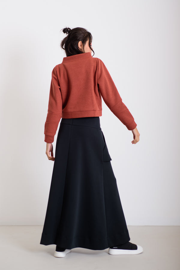 Pulcsi paneles könyökkel